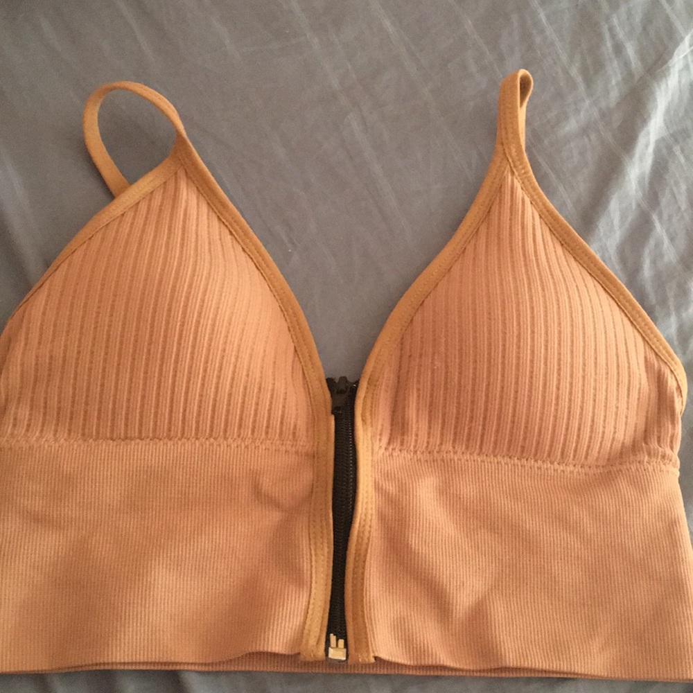 This is a zip up crop top size small in pink!